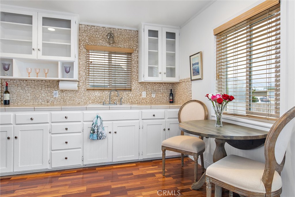 440 Java Street Morro Bay, CA 93442 - Photo 9 of 22 a kitchen with granite countertop wooden cabinets and a granite counter tops