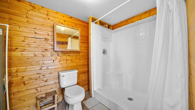 a view of a balcony with hardwood floor