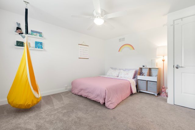 35013 North James Ingleside, IL 60041 - Photo 25 of 46 a bedroom with a bed and a table