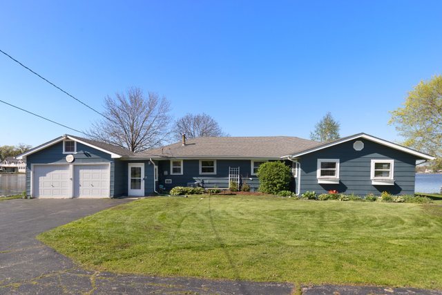 35013 North James Ingleside, IL 60041 - Photo 3 of 46 a view of a house with a yard