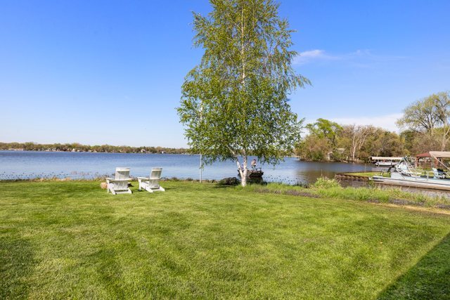 35013 North James Ingleside, IL 60041 - Photo 37 of 46 a view of a lake with houses in the back