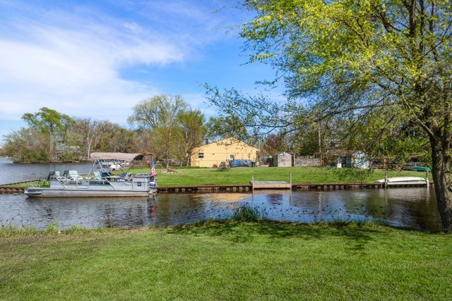 35013 North James Ingleside, IL 60041 - Photo 38 of 46 an aerial view of a house with a garden and lake view