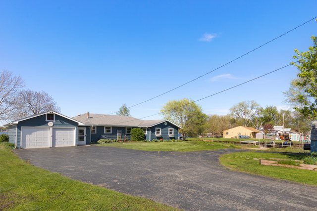 35013 North James Ingleside, IL 60041 - Photo 41 of 46 a front view of a house with garden