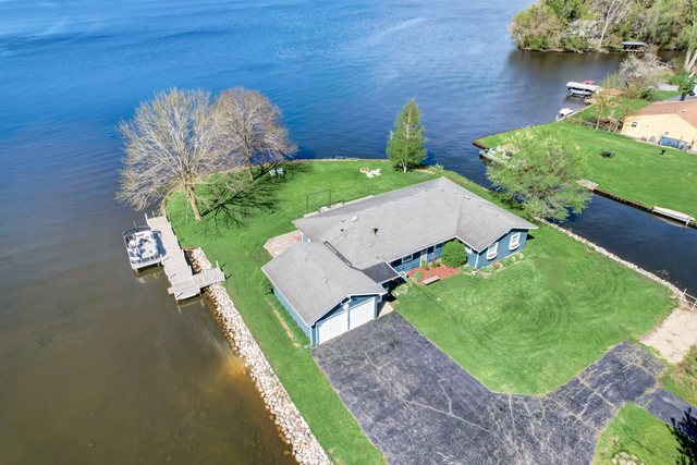 35013 North James Ingleside, IL 60041 - Photo 42 of 46 an aerial view of a house with a yard and lake view