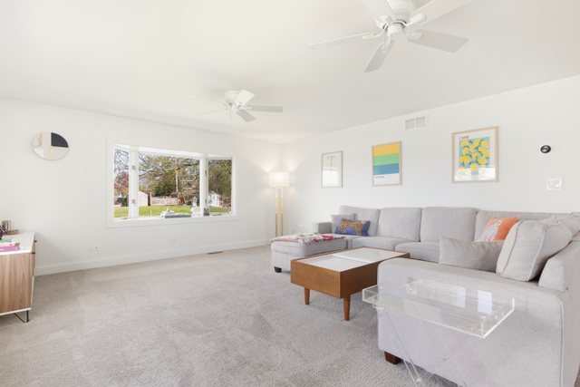35013 North James Ingleside, IL 60041 - Photo 6 of 46 a living room with furniture and painting on the wall
