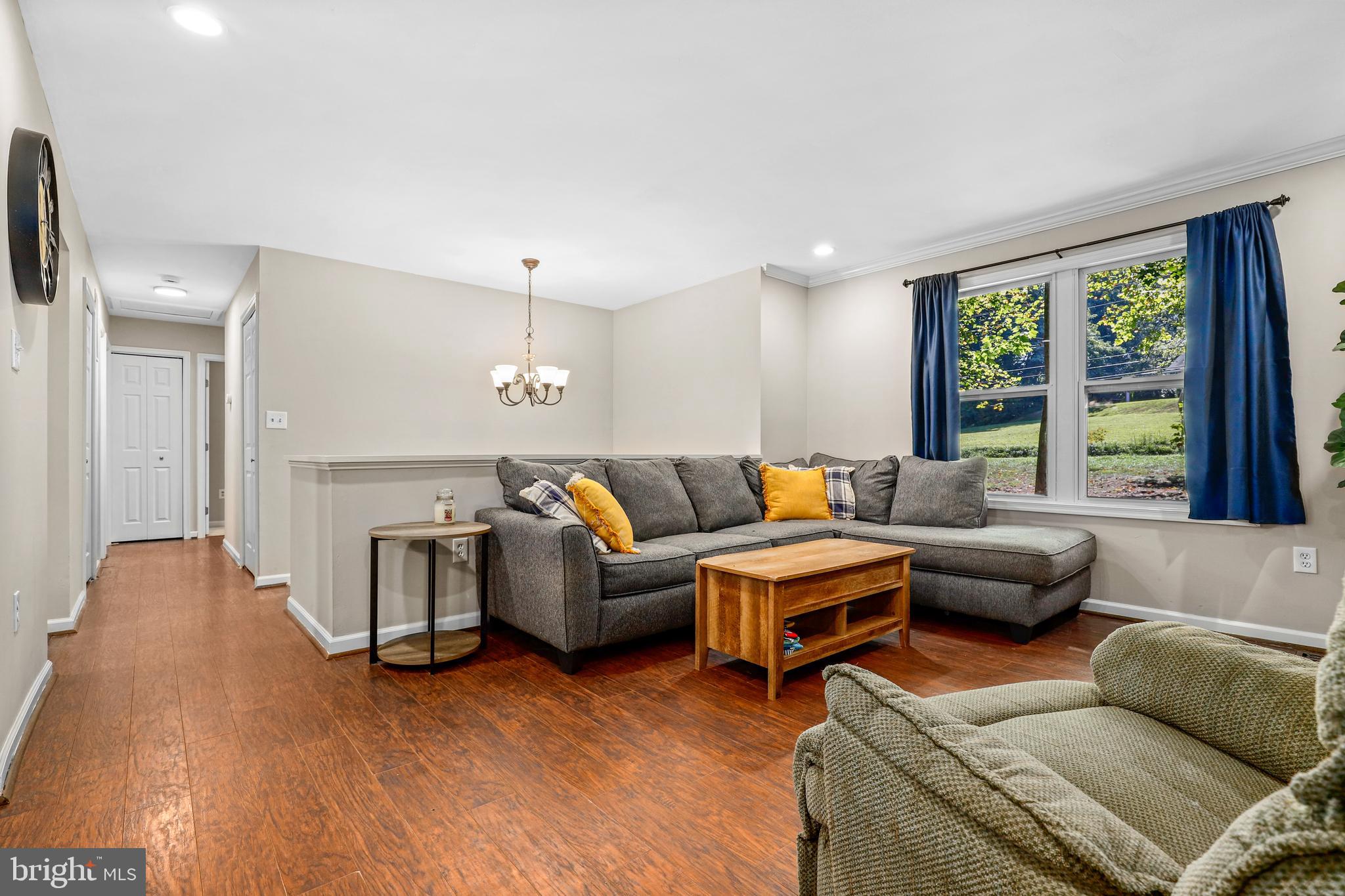 956 Wilson Road Huntingtown, MD 20639 - Photo 17 of 42 a living room with furniture and a large window