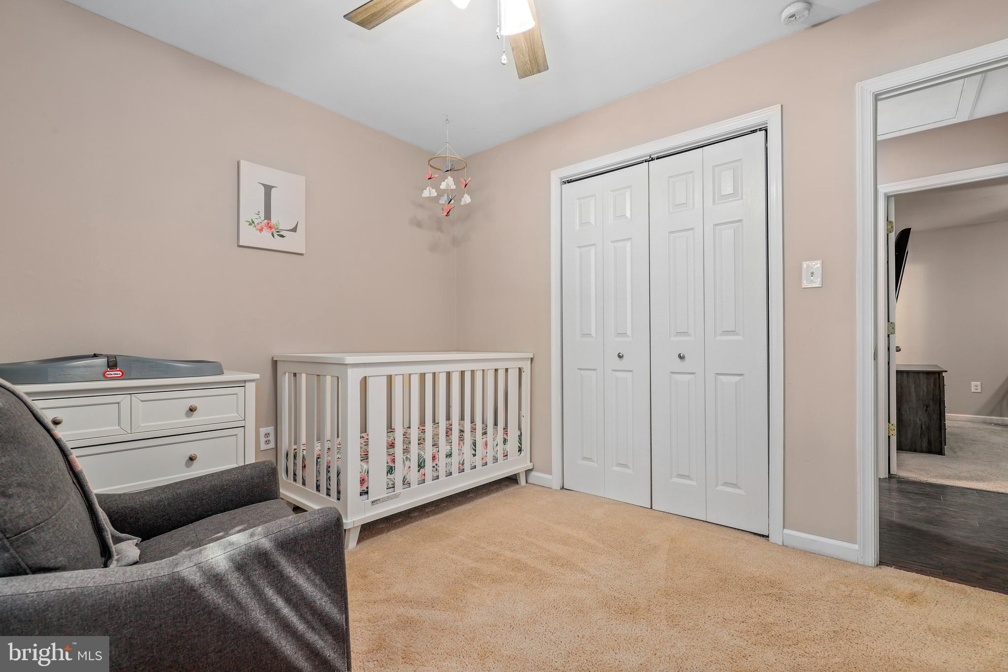 956 Wilson Road Huntingtown, MD 20639 - Photo 24 of 42 a bedroom with furniture and a window