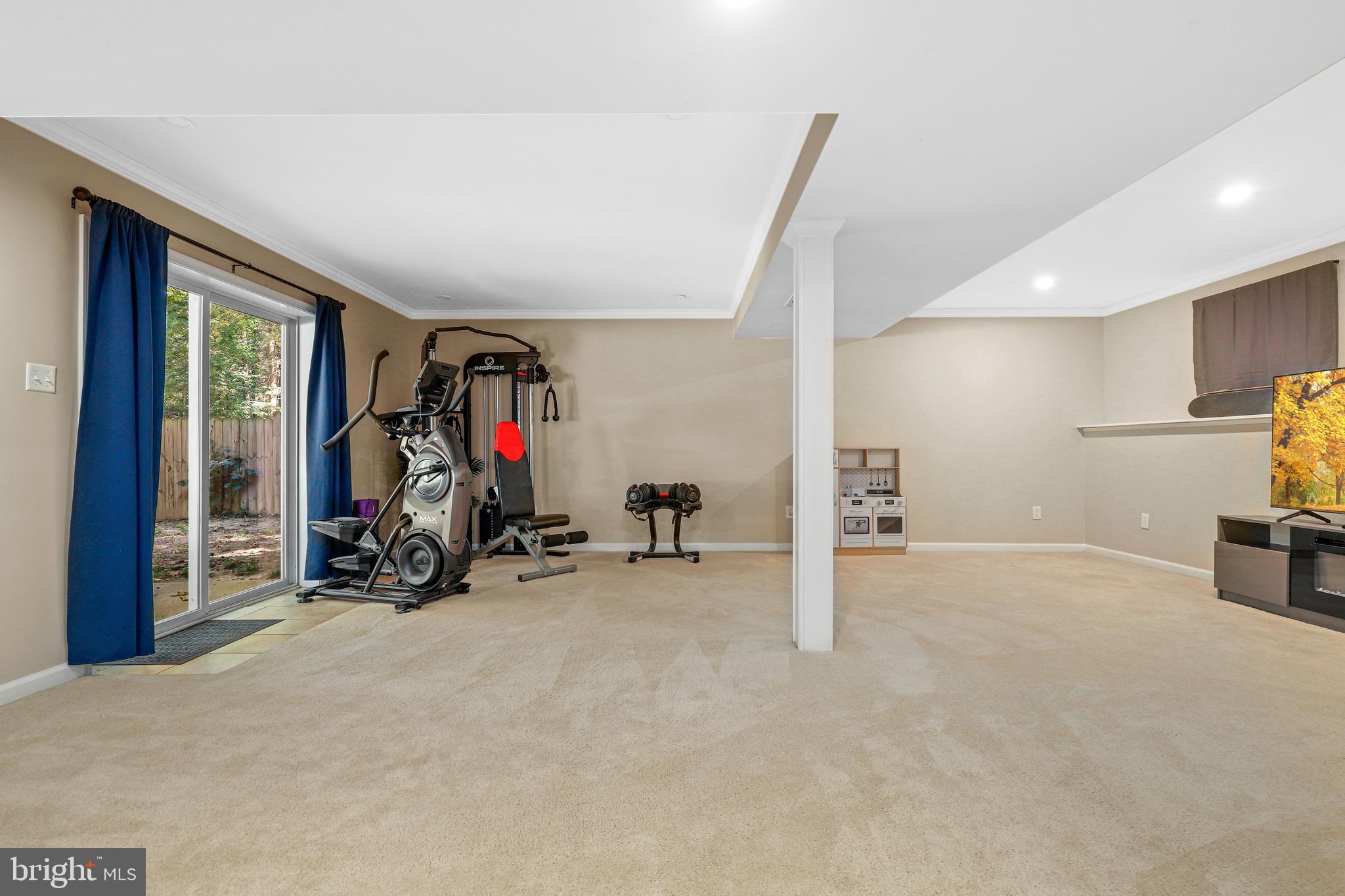 956 Wilson Road Huntingtown, MD 20639 - Photo 29 of 42 a view of a room with gym equipment