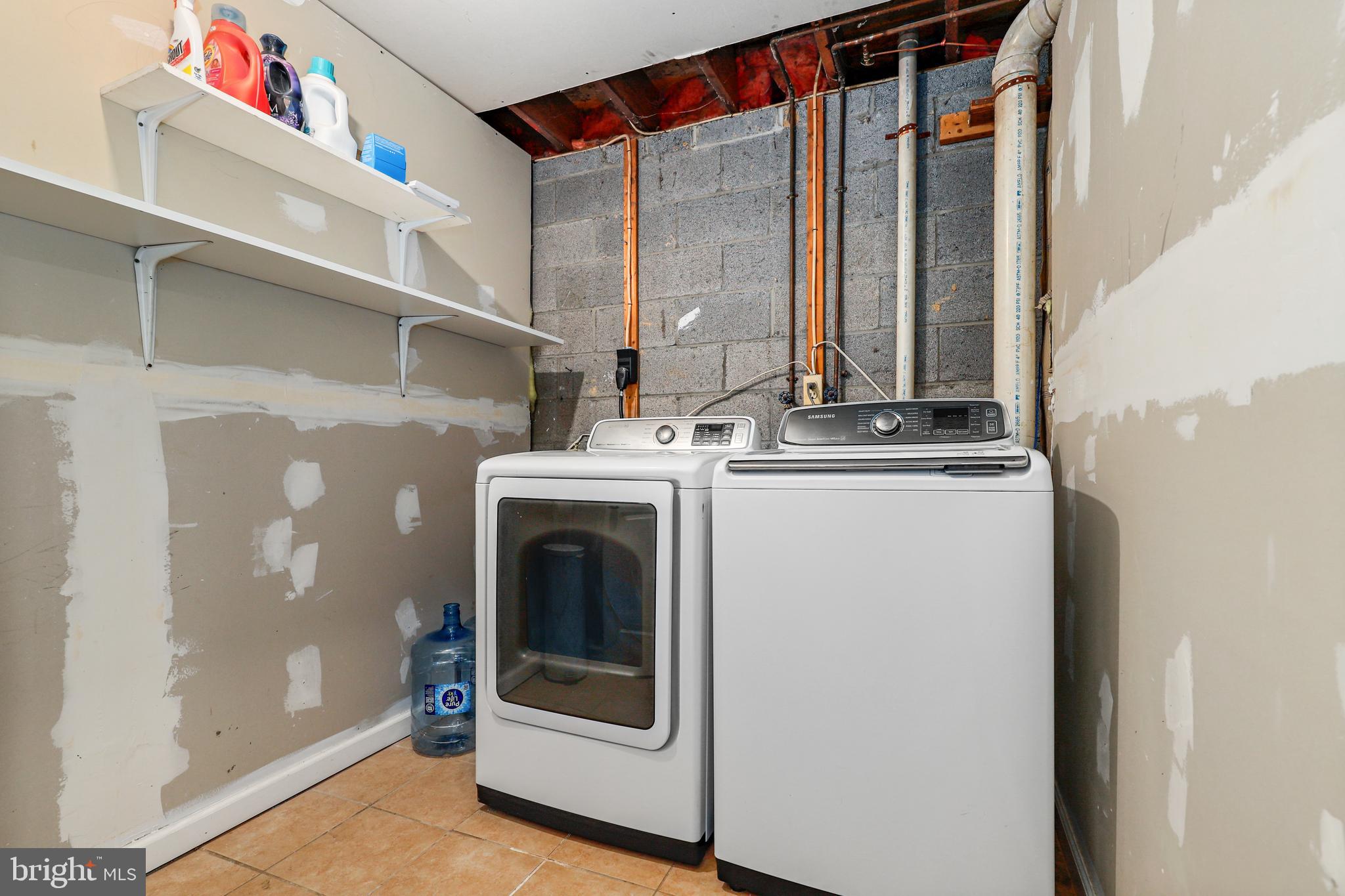 956 Wilson Road Huntingtown, MD 20639 - Photo 35 of 42 a utility room with dryer and washer