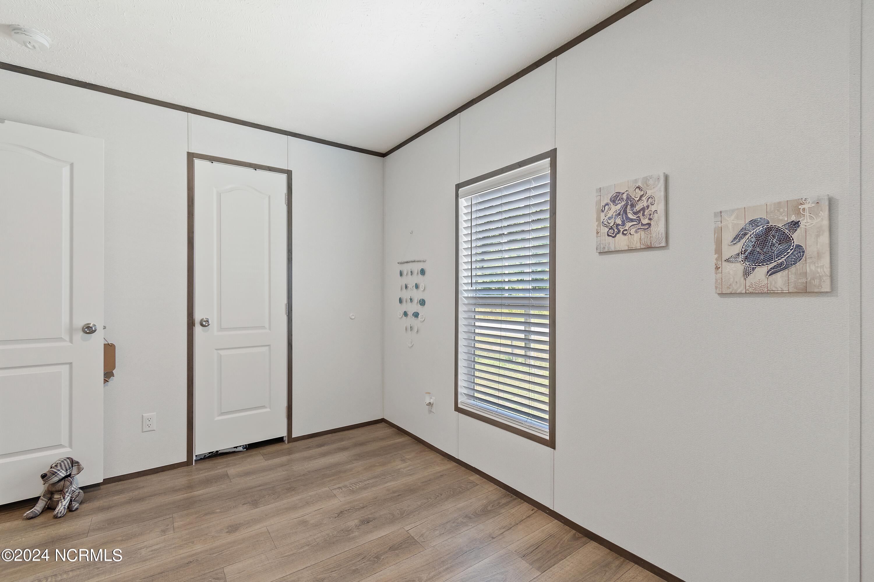 930 Pineclair Drive Southwest Calabash, NC 28467 - Photo 20 of 24 Guest bedroom 1