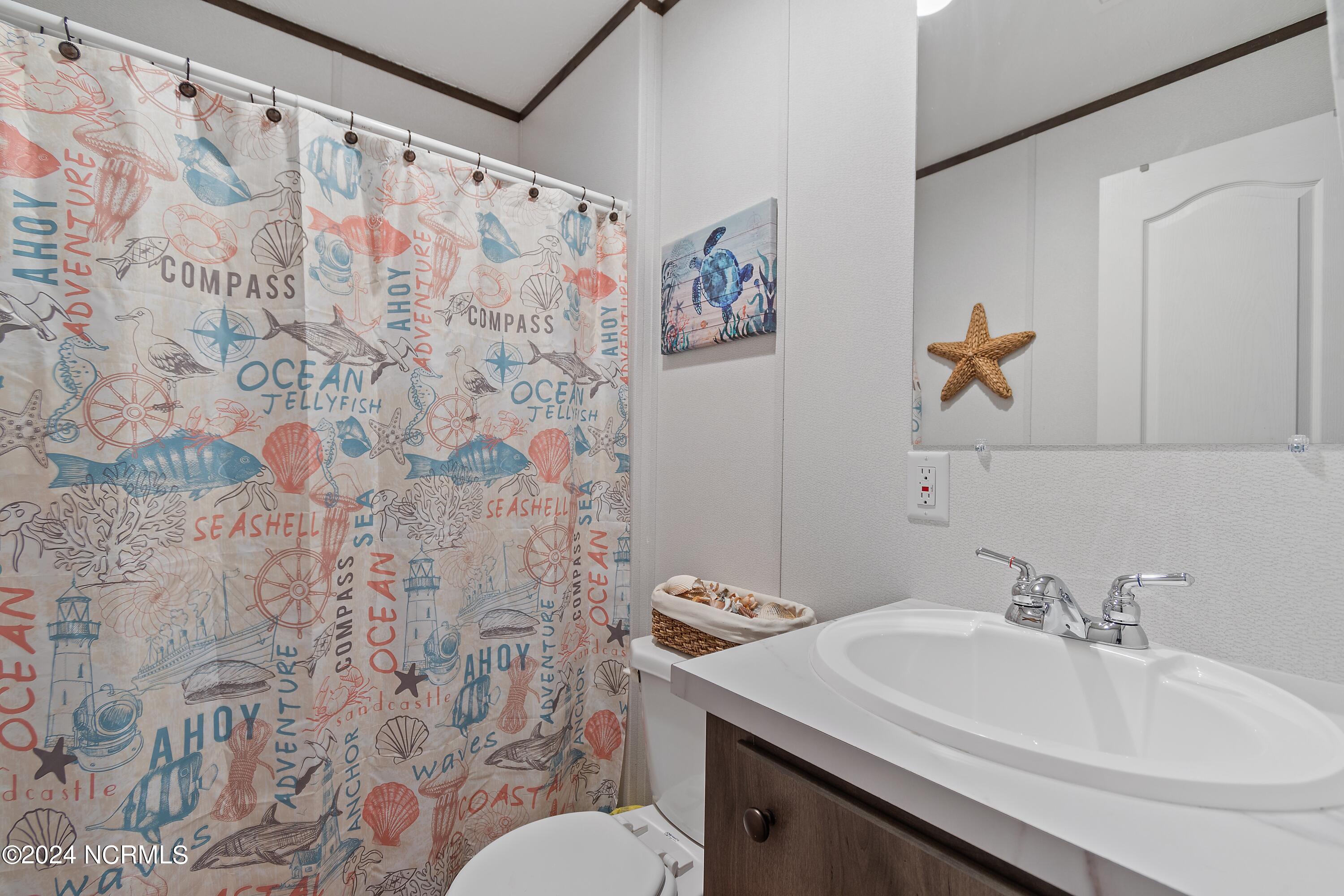 930 Pineclair Drive Southwest Calabash, NC 28467 - Photo 21 of 24 Guest bathroom