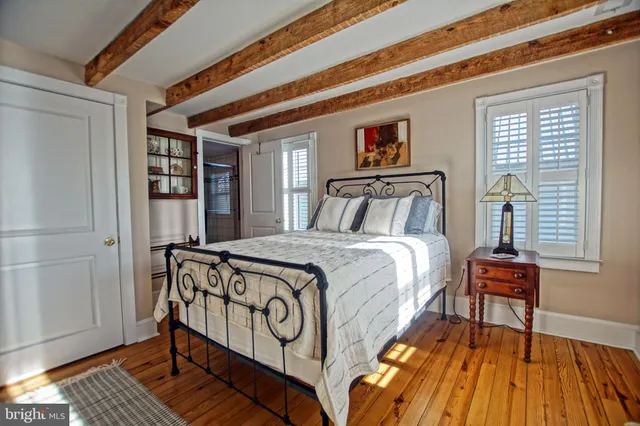 a view of a dining room with furniture and window