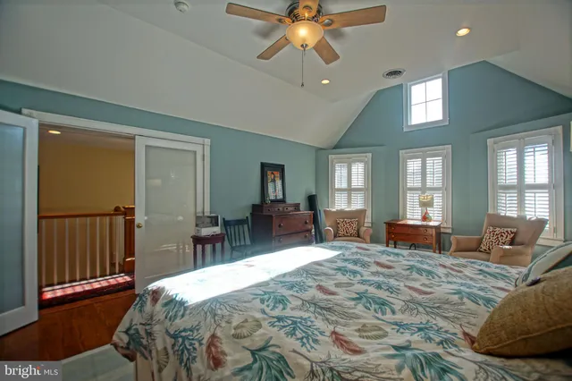 a living room with furniture and windows