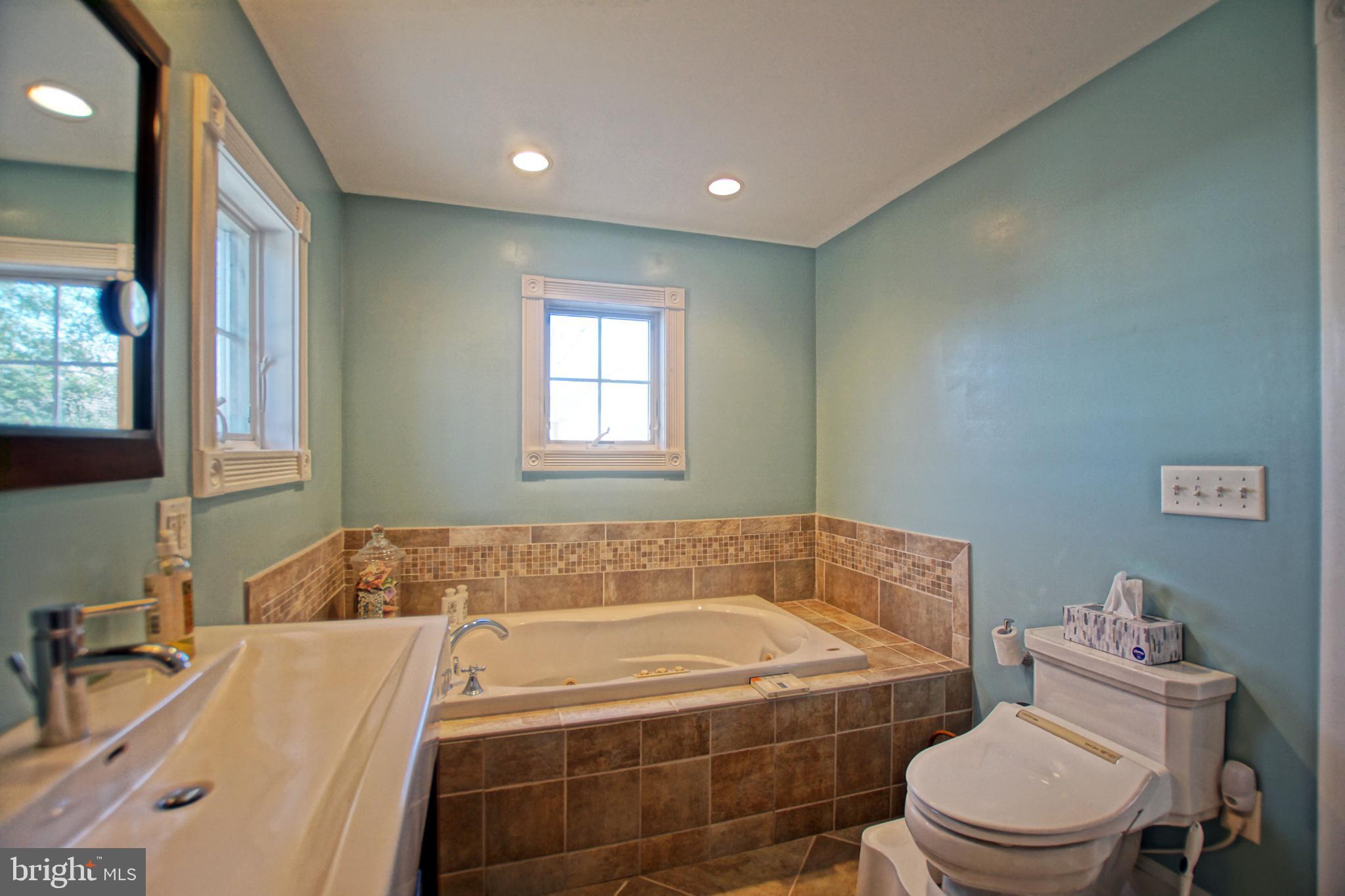 119 Dewey Avenue Lewes, DE 19958 - Photo 40 of 54 Serene bathroom with modern finishes.