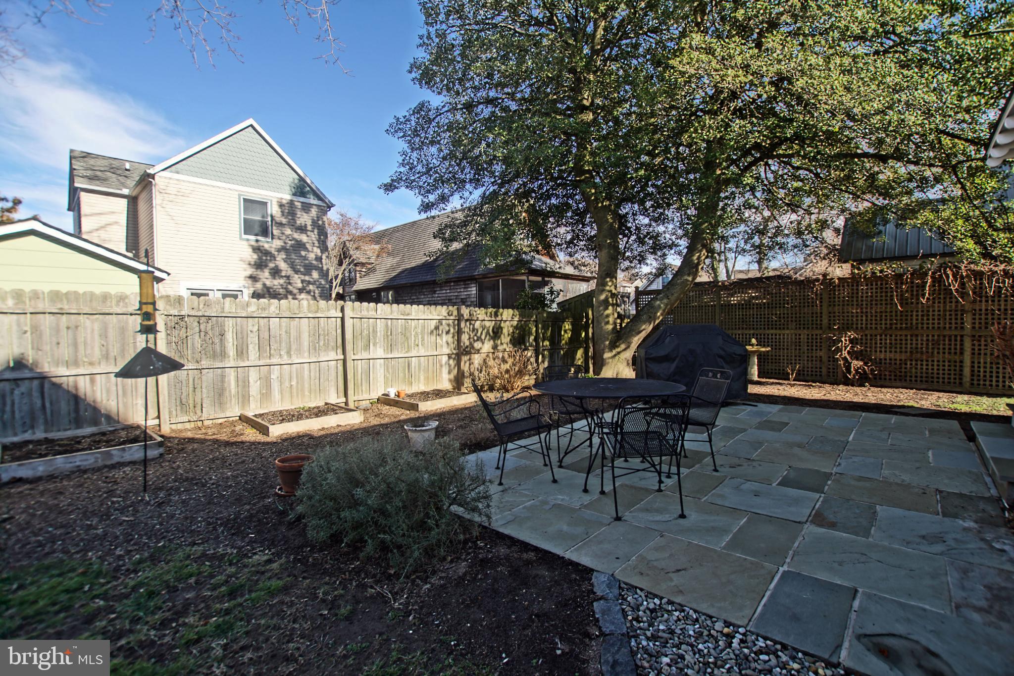 119 Dewey Avenue Lewes, DE 19958 - Photo 45 of 54 Serene backyard oasis with stone patio.