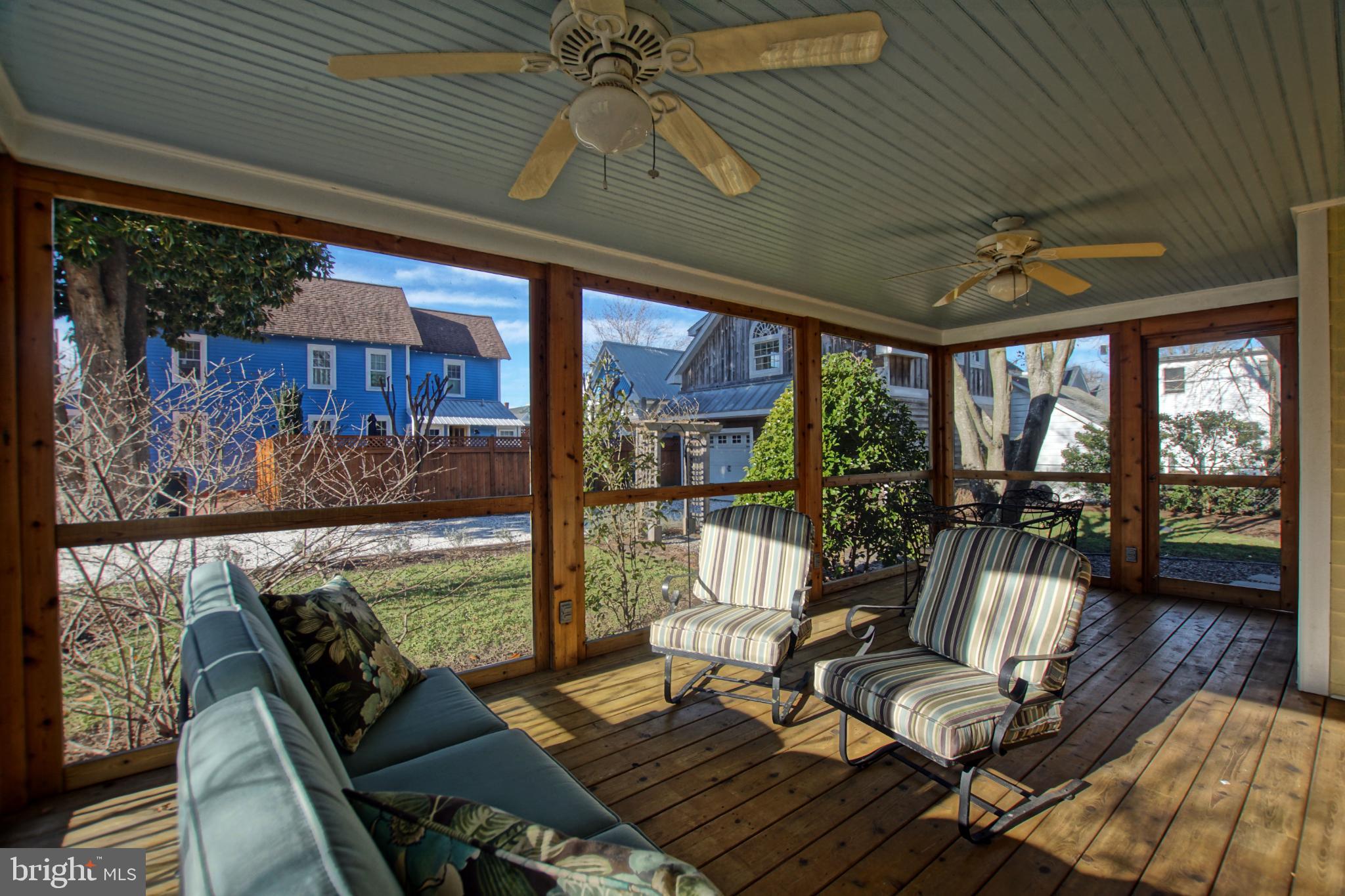 119 Dewey Avenue Lewes, DE 19958 - Photo 47 of 54 Charming screened porch with serene views.