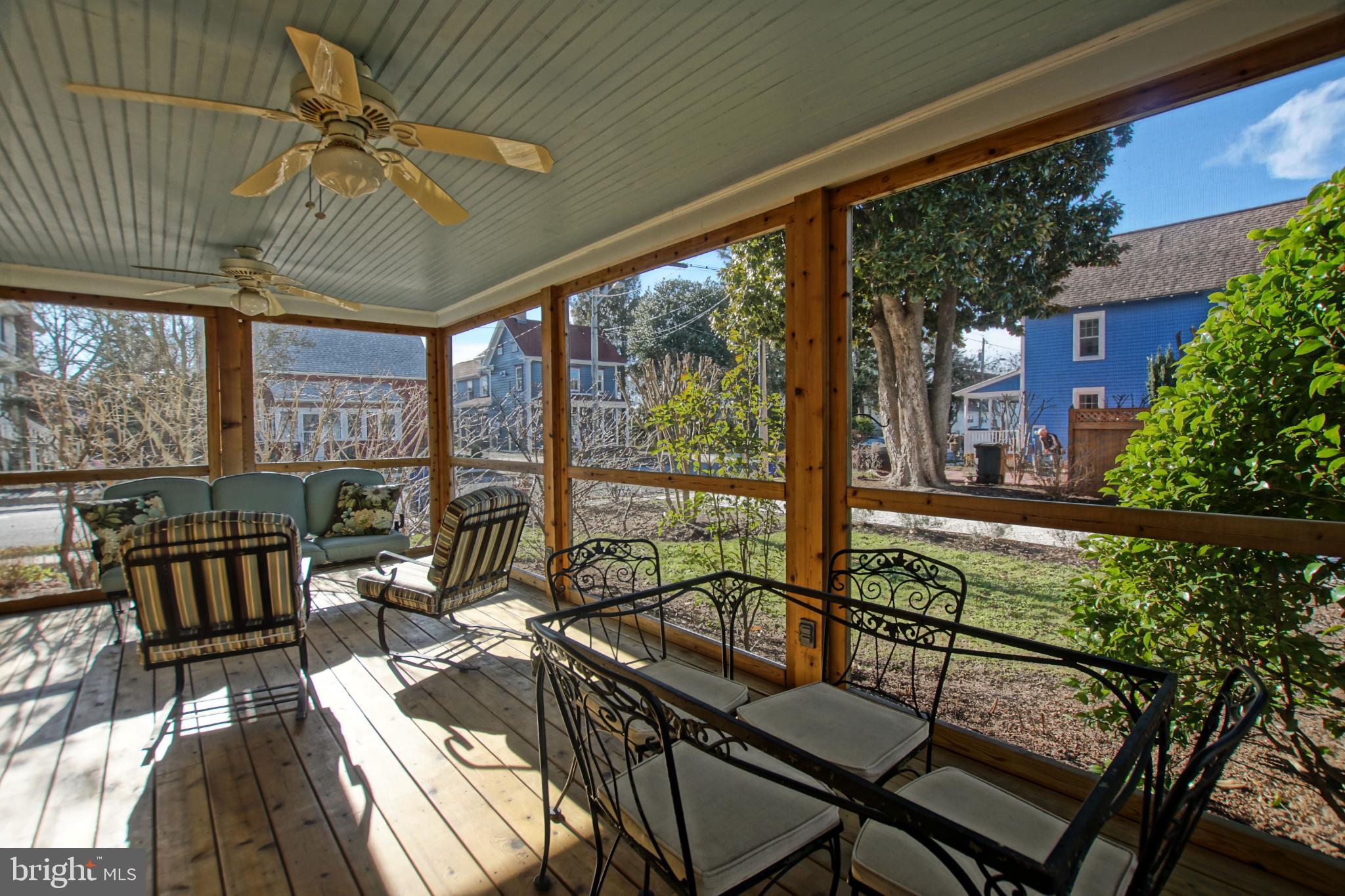 119 Dewey Avenue Lewes, DE 19958 - Photo 49 of 54 Charming porch with serene outdoor views.