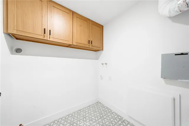 a view of a house with sitting area and garden