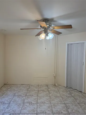 a view of an empty room with window