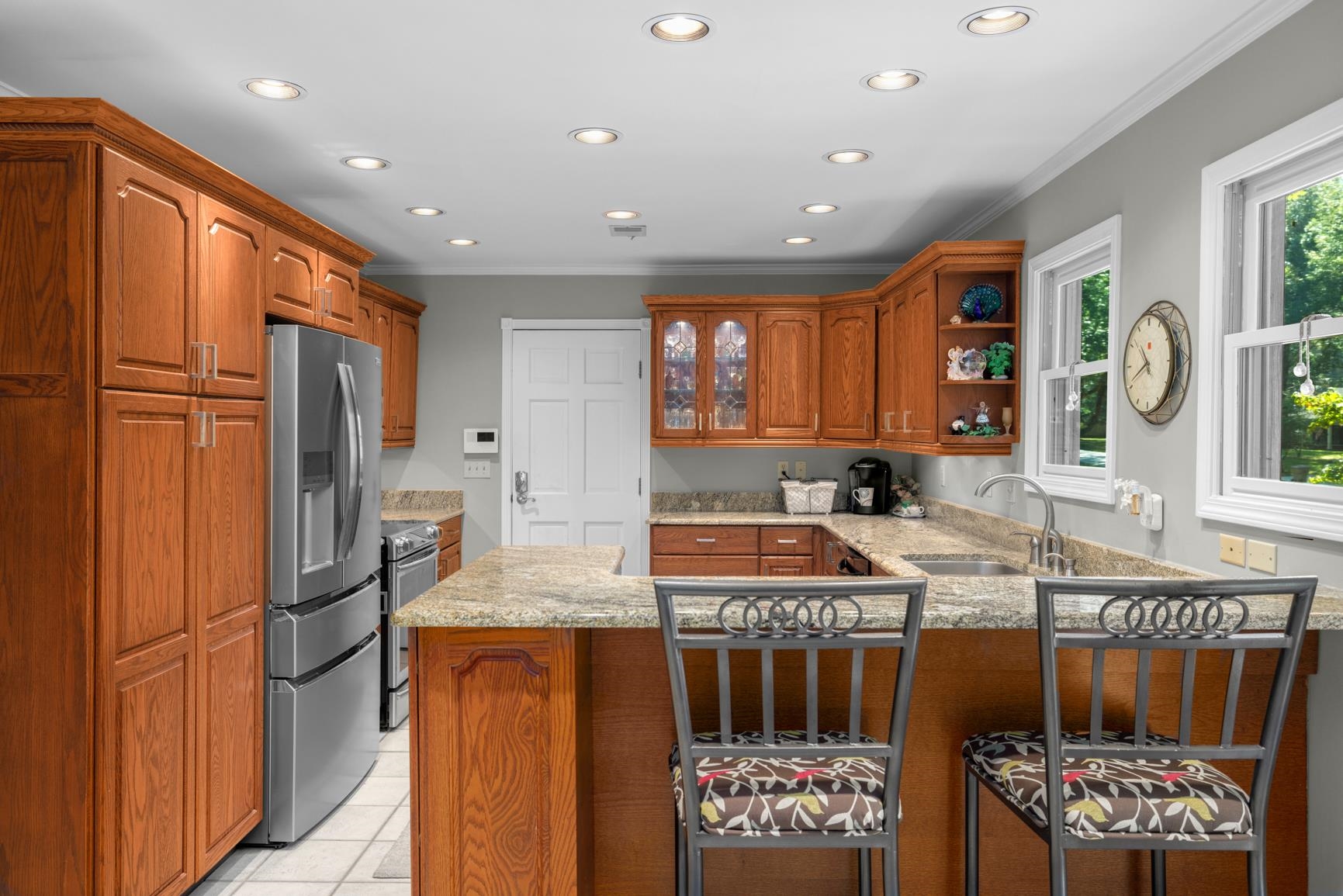 120 Blueberry Road Eads, TN 38028 - Photo 15 of 35 Breakfast/Snack Bar, counterspace made for baking! Open concept with views of the Dining Room, and deer from the kitchen!