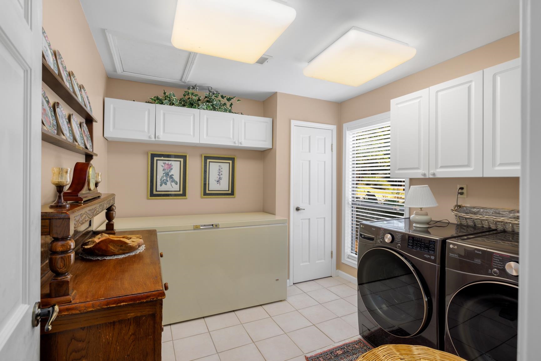 120 Blueberry Road Eads, TN 38028 - Photo 19 of 35 A true Laundry Room! Cabinets and closet for storage and lots of space to do laundry.