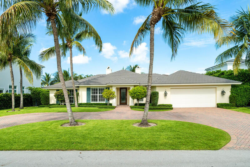 2377 East Silver Palm Road Boca Raton, FL 33432 - Photo 2 of 40 a front view of house with yard and green space