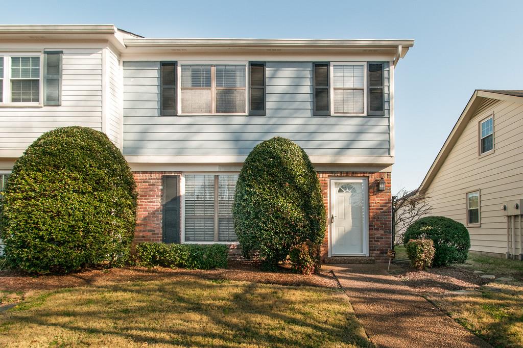 951 General George Patton Road Nashville, TN 37221 - Photo 1 of 25 a view of a house with a yard and potted plants