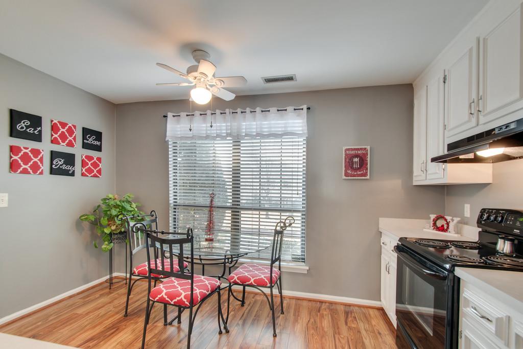 951 General George Patton Road Nashville, TN 37221 - Photo 15 of 25 a view of a dining room with furniture window and wooden floor