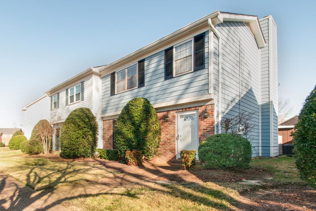 951 General George Patton Road Nashville, TN 37221 - Photo 2 of 25 a front view of a house with garden