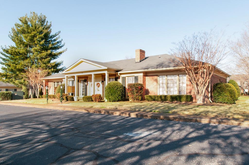 951 General George Patton Road Nashville, TN 37221 - Photo 24 of 25 a front view of a house with a yard and trees