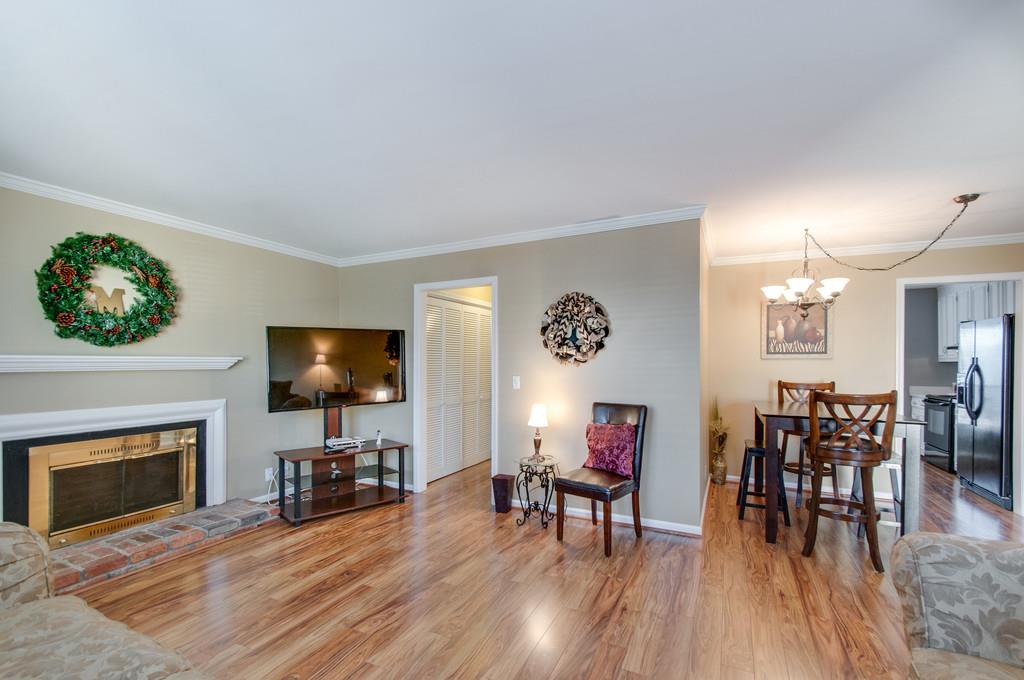951 General George Patton Road Nashville, TN 37221 - Photo 6 of 25 a view of a livingroom with furniture and a flat screen tv