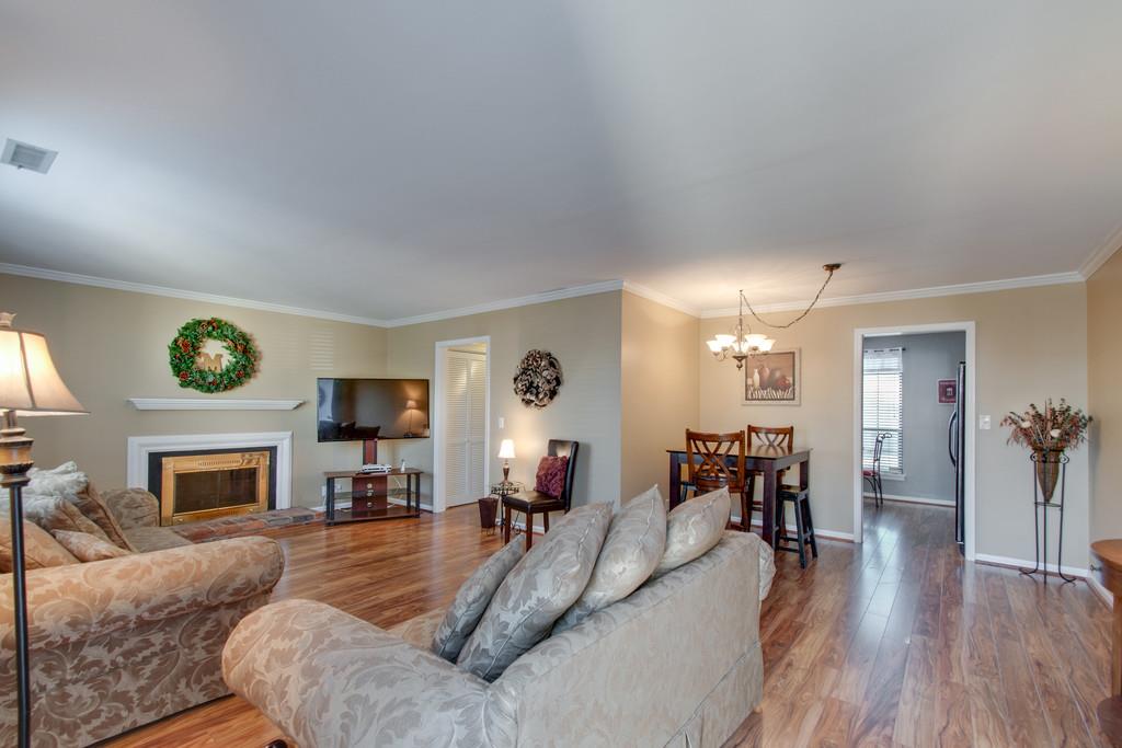951 General George Patton Road Nashville, TN 37221 - Photo 10 of 25 a living room with furniture and a fireplace