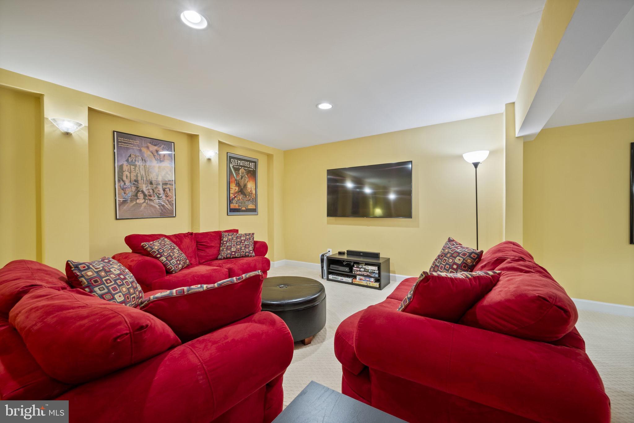4310 Necker Avenue Nottingham, MD 21236 - Photo 39 of 56 a living room with furniture and a flat screen tv