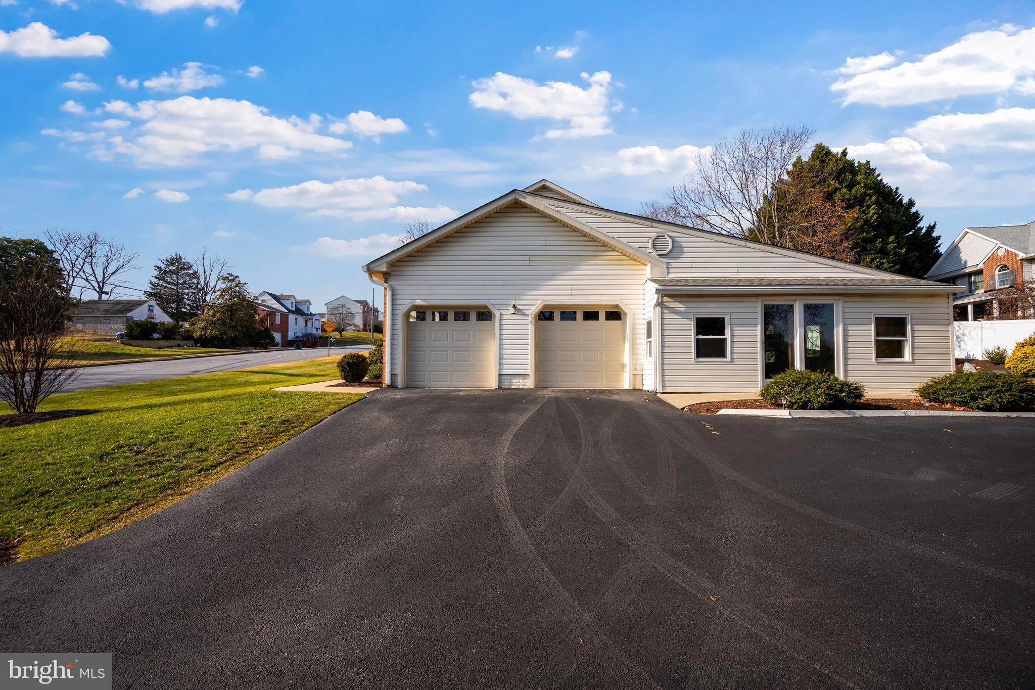 4310 Necker Avenue Nottingham, MD 21236 - Photo 4 of 56 a front view of a house with a yard