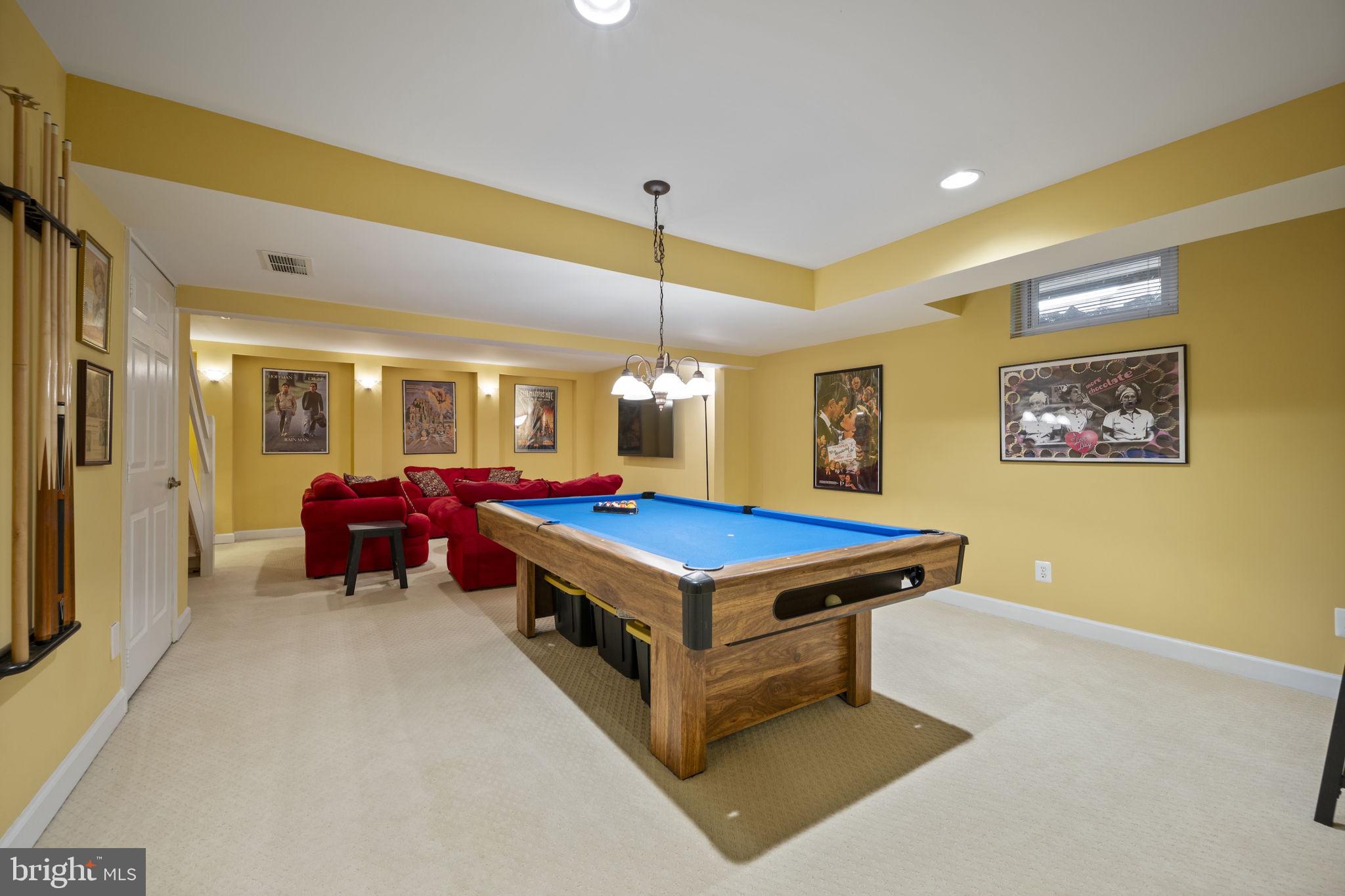 4310 Necker Avenue Nottingham, MD 21236 - Photo 41 of 56 a room with pool table and a chandelier