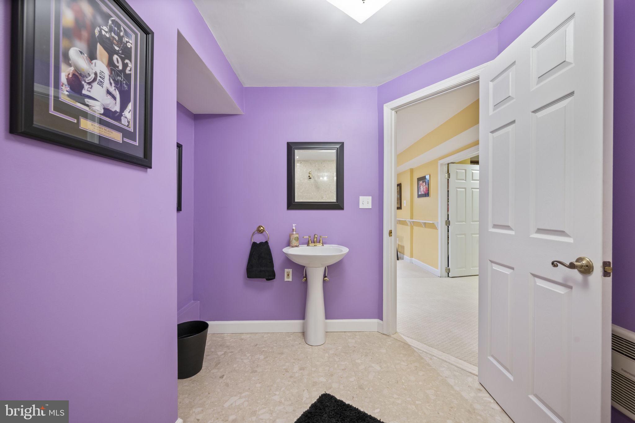 4310 Necker Avenue Nottingham, MD 21236 - Photo 45 of 56 a bathroom with a bathtub and shower