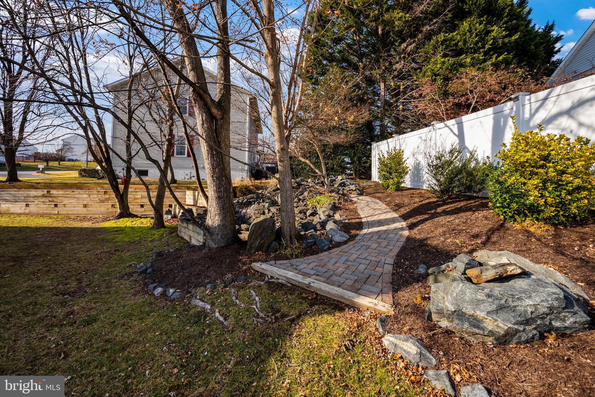 4310 Necker Avenue Nottingham, MD 21236 - Photo 51 of 56 Trickling waterfall to Koi Pond