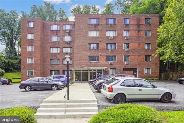 a car parked in front of a building