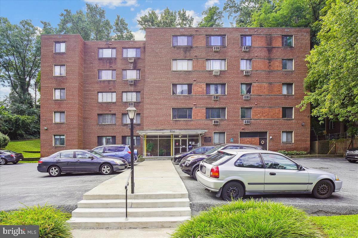 a car parked in front of a building