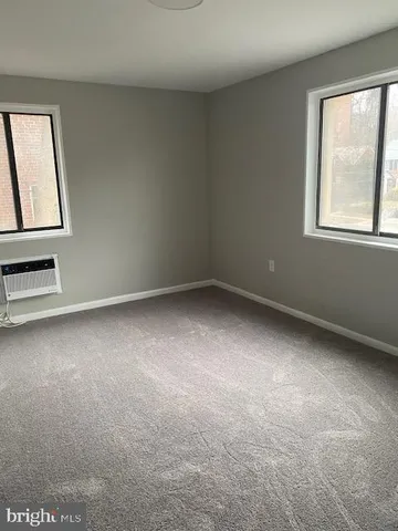 a bathroom with a toilet and a sink