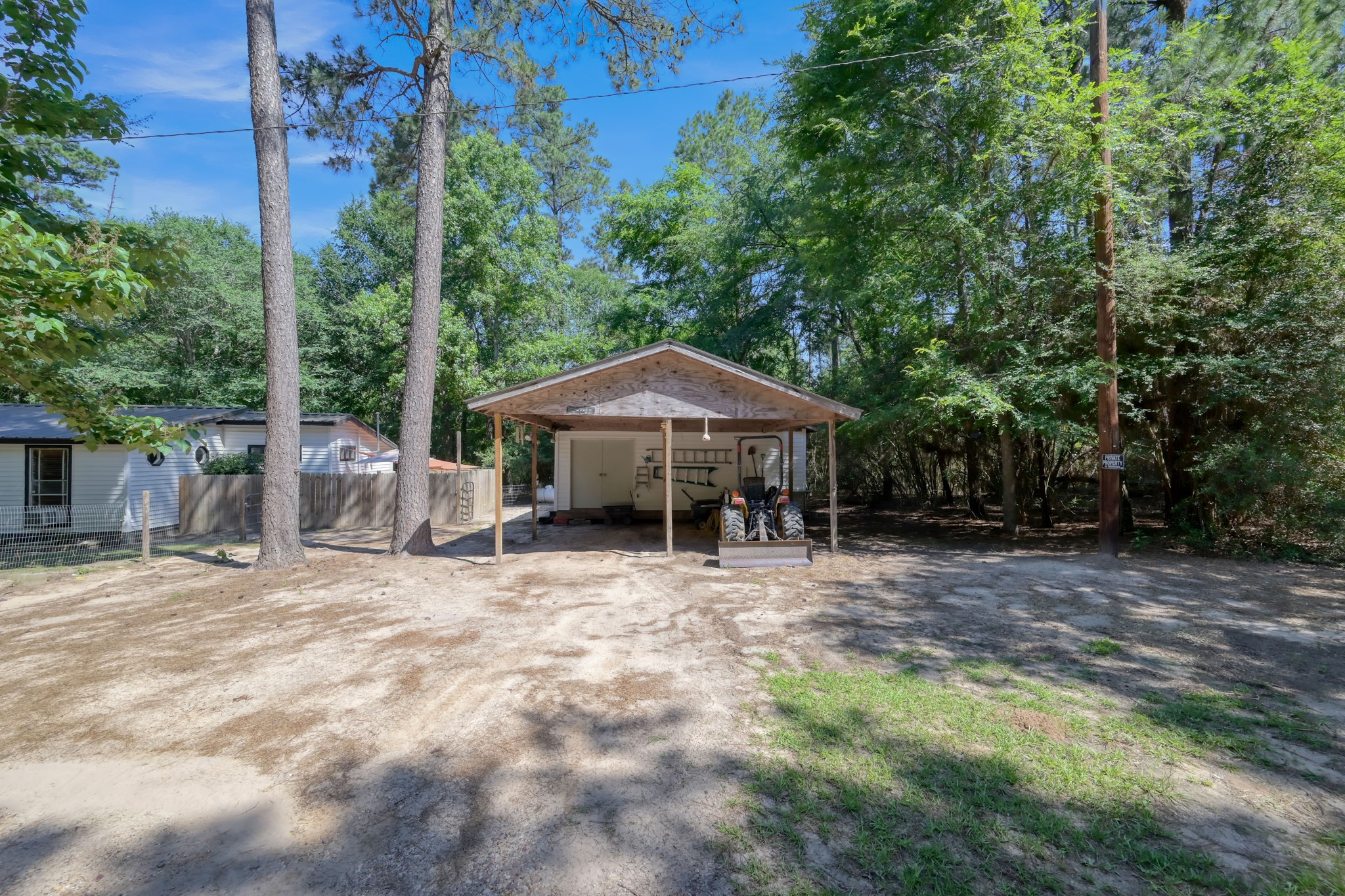 263 Travis Lane Trinity, TX 75862 - Photo 26 of 34 Workshop & Carport