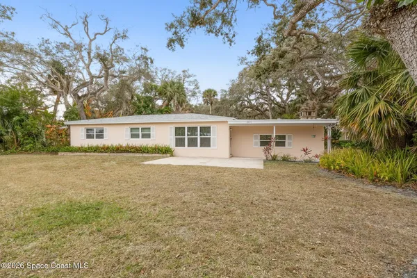 a house view with a garden space