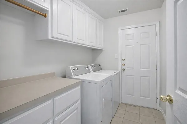 a utility room with a sink