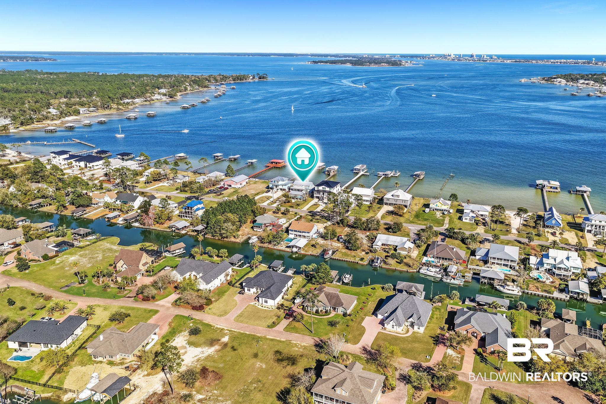 6434 County Road 95 Elberta, AL 36530 - Photo 80 of 99 Aerial perspective of suburban area with a nearby body of water
