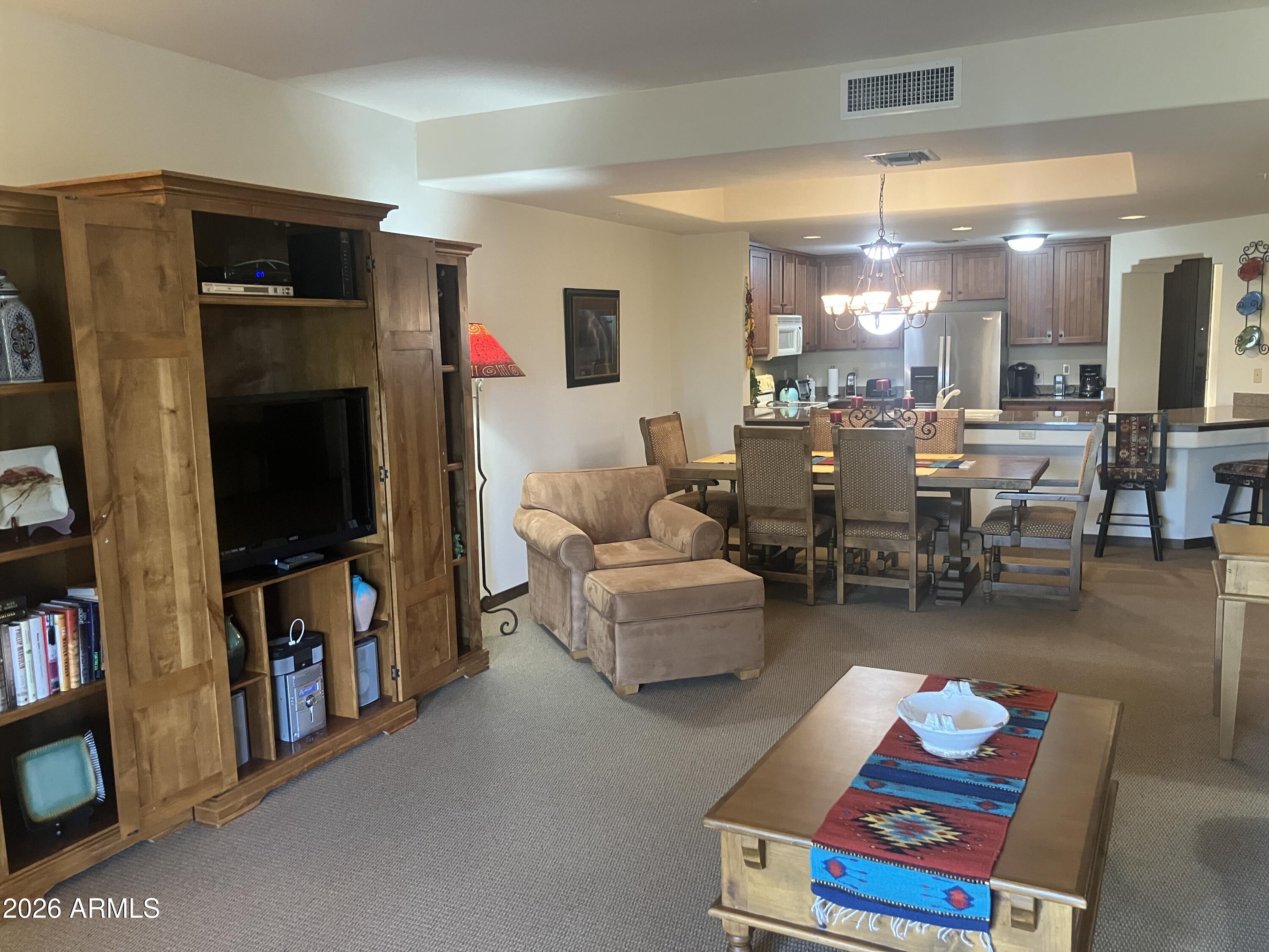 36601 North Mule Train Road, Unit 15A Carefree, AZ 85377 - Photo 14 of 31 from Living Room to Kitchen