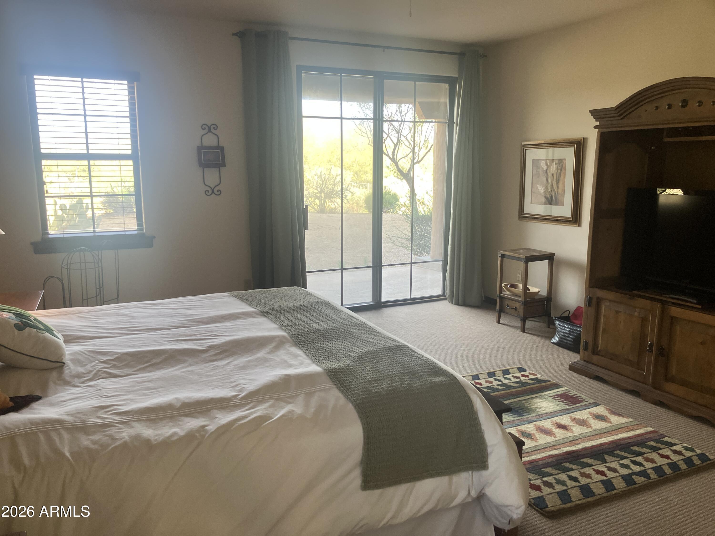 36601 North Mule Train Road, Unit 15A Carefree, AZ 85377 - Photo 20 of 31 Master Suite Bedroom