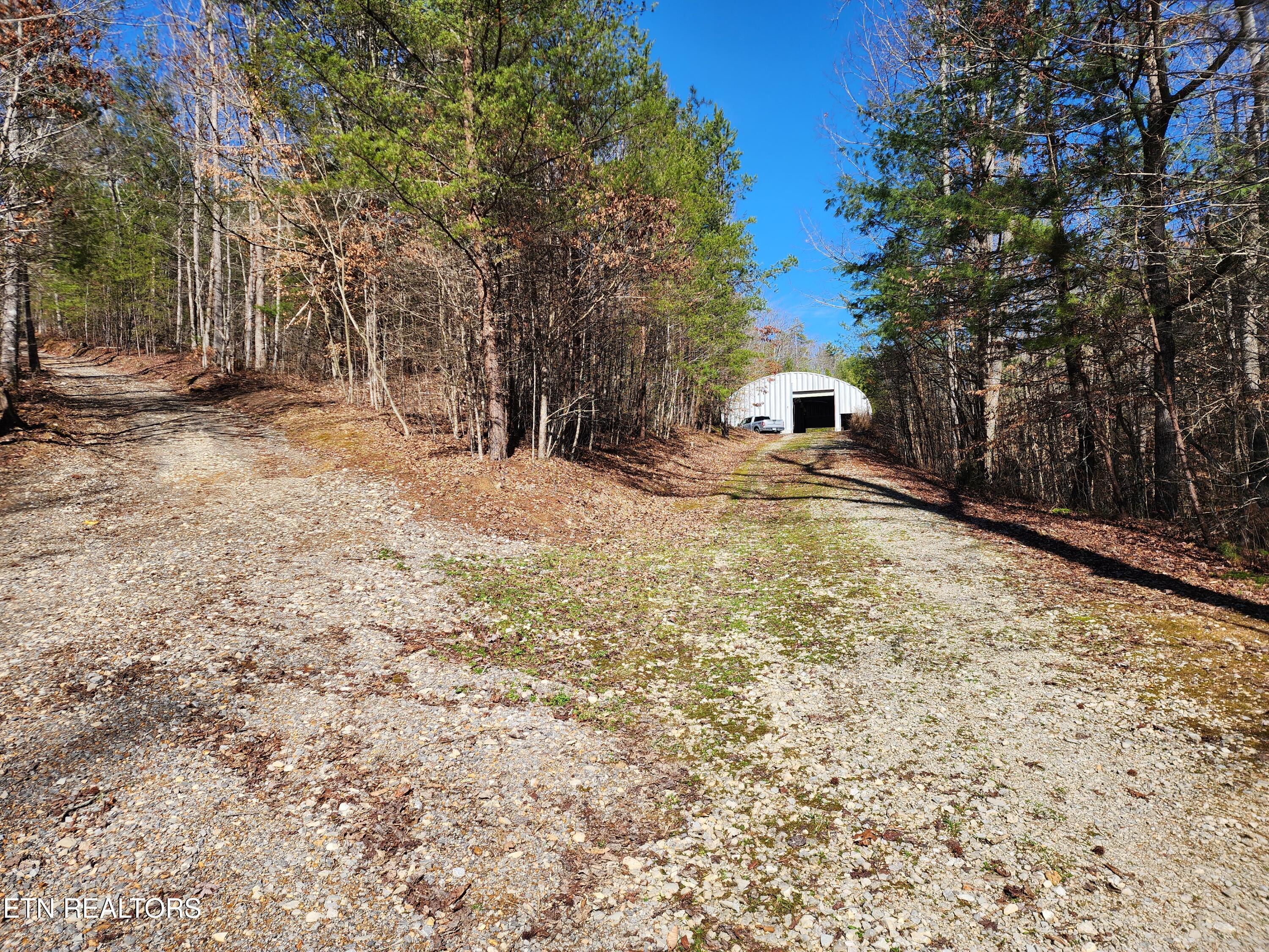 527 Smokey Branch Road Vonore, TN 37885 - Photo 4 of 46 Building to right, left .6 miles to top