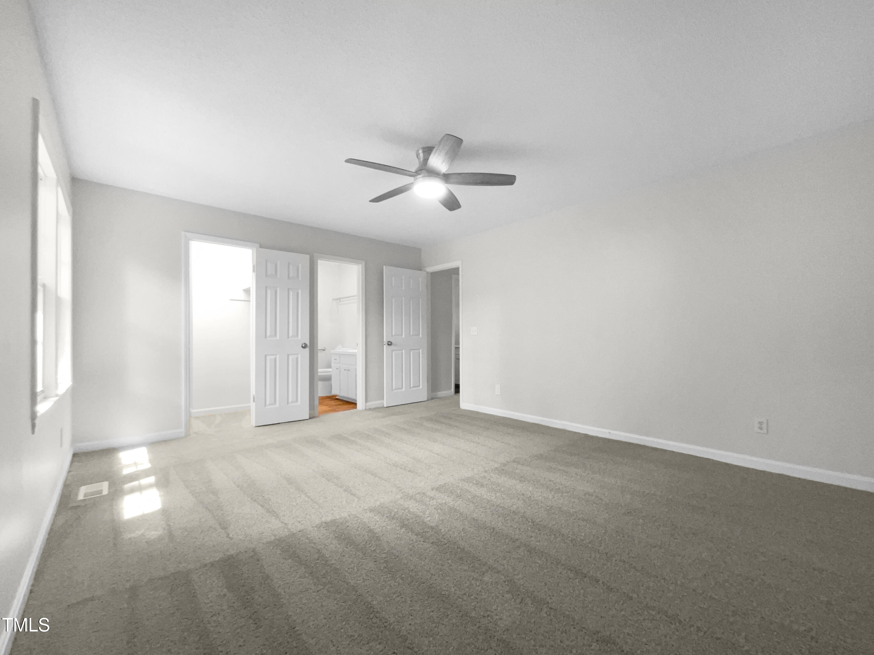1516 Clayton Road Fuquay-Varina, NC 27526 - Photo 5 of 17 a view of an empty room with a window