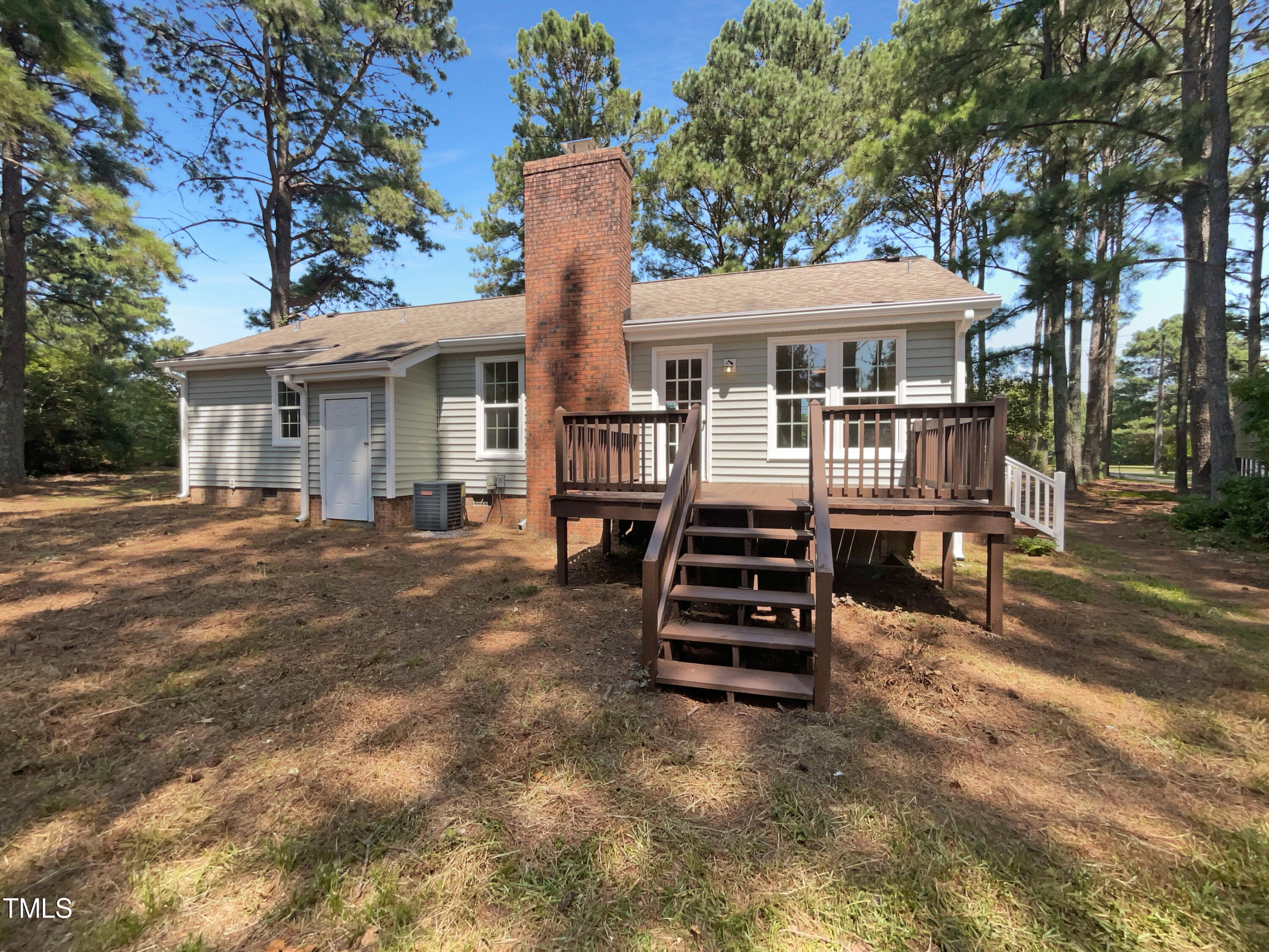 1516 Clayton Road Fuquay-Varina, NC 27526 - Photo 7 of 17 front view of a house with a yard