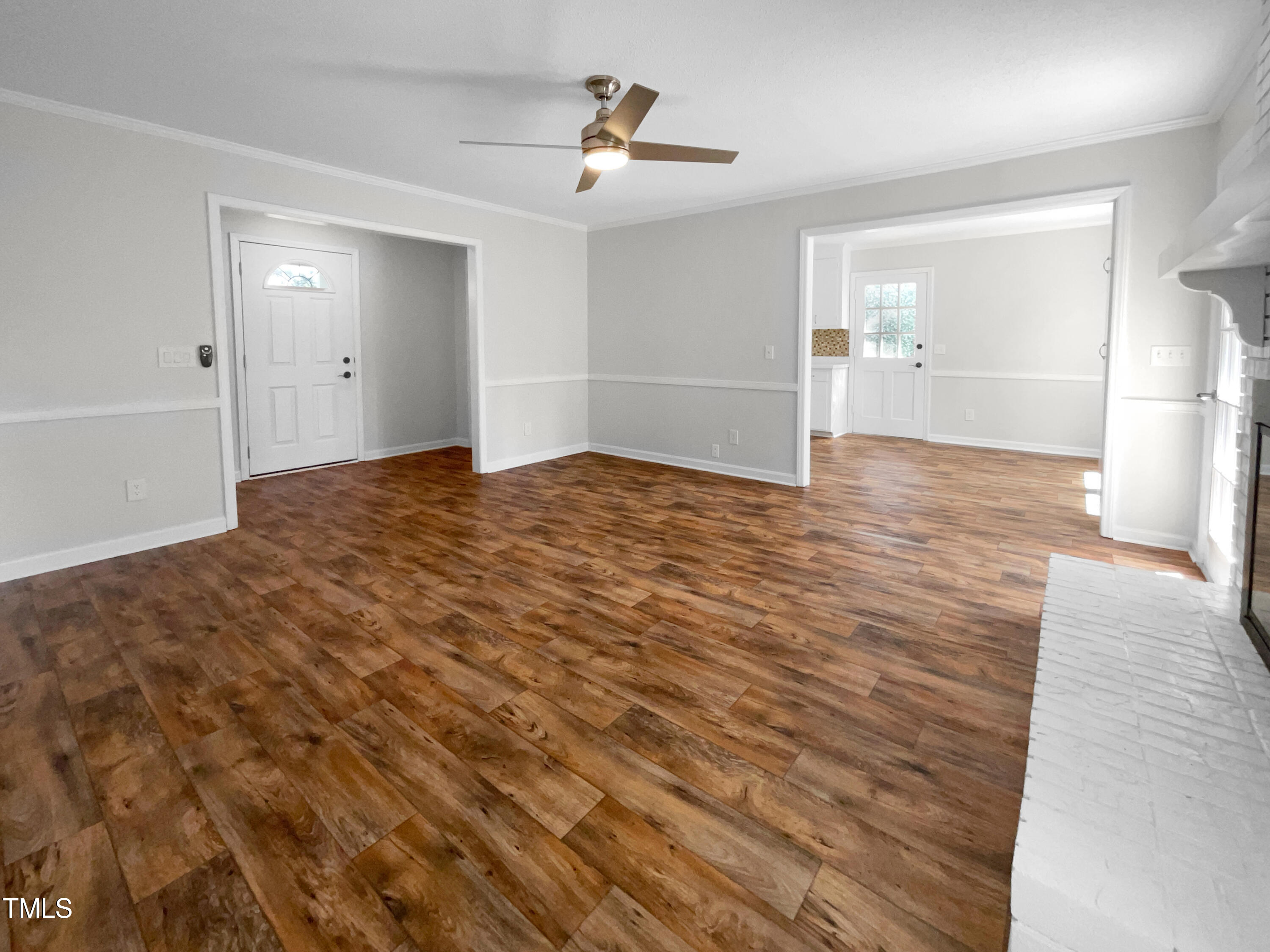 1516 Clayton Road Fuquay-Varina, NC 27526 - Photo 9 of 17 a view of empty room with wooden floor